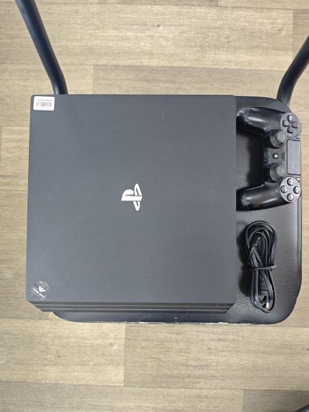 Купить Sony PlayStation 4 Pro 1TB (CUH-7208B) в Ангарск за 20150 руб.