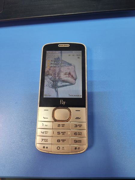 Купить Fly TS111+  три сим карты в Иркутск за 400 руб.