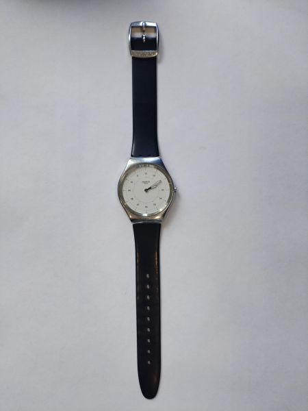 Купить Swatch Skin Skinnoirirron Public SYXS100 в Иркутск за 1900 руб.