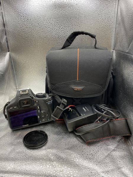 фотоаппарат Canon EOS 550D (DS126271) kit с СЗУ в Томск