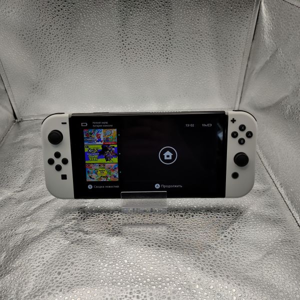 Купить Nintendo Switch OLED 64GB (HEG-001) в Томск за 18100 руб.
