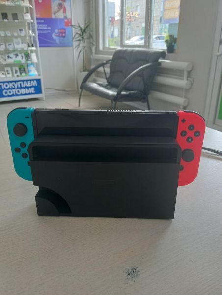 Купить Nintendo Switch OLED 64GB (HEG-001) в Тулун за 19450 руб.