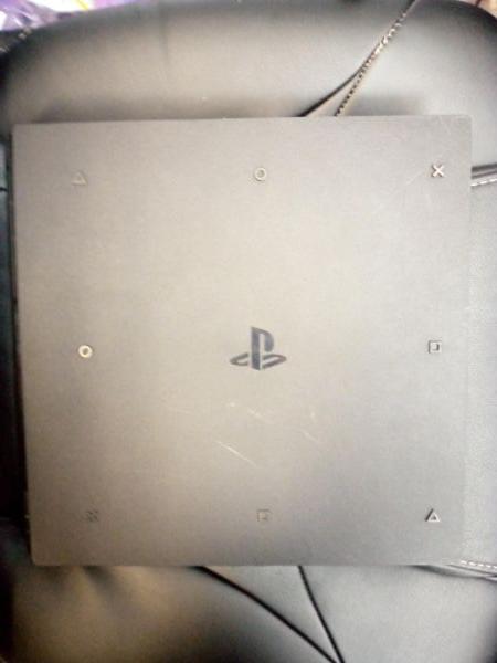 Купить Sony PlayStation 4 Pro 1TB (CUH-7008B) в Усть-Илимск за 23599 руб.