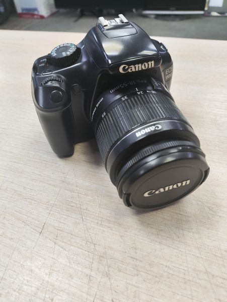 Купить Canon EOS 1100D (DS126291) Kit с СЗУ в Томск за 5599 руб.