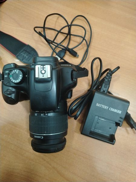фотоаппарат Canon EOS 1100D (DS126291) Kit с СЗУ в Шелехов