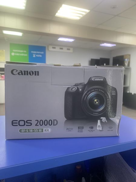 фотоаппарат Canon EOS 2000D (DS126741) kit с СЗУ в Ангарск